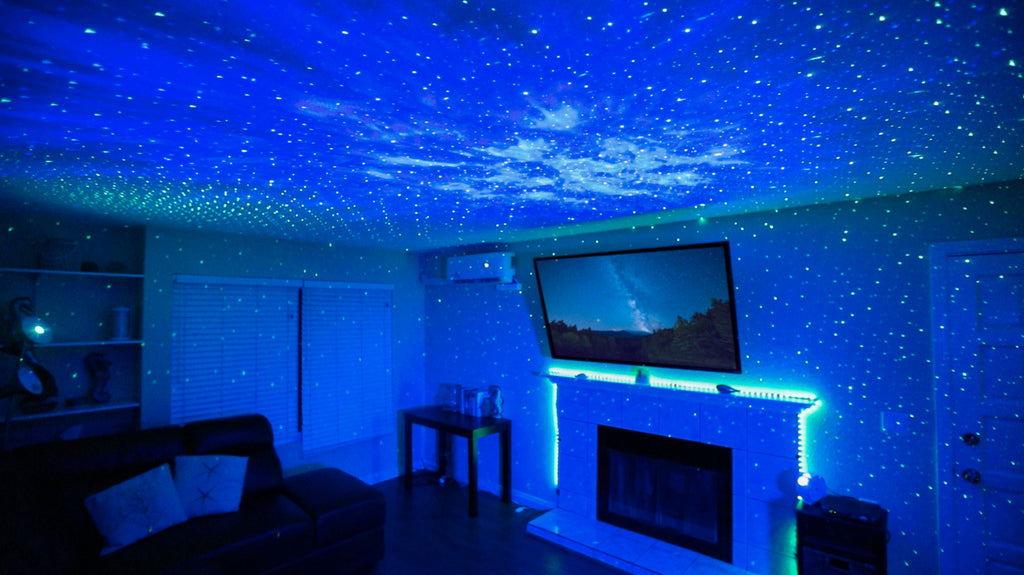 tv room with fireplace mantle lights and galaxy lighting