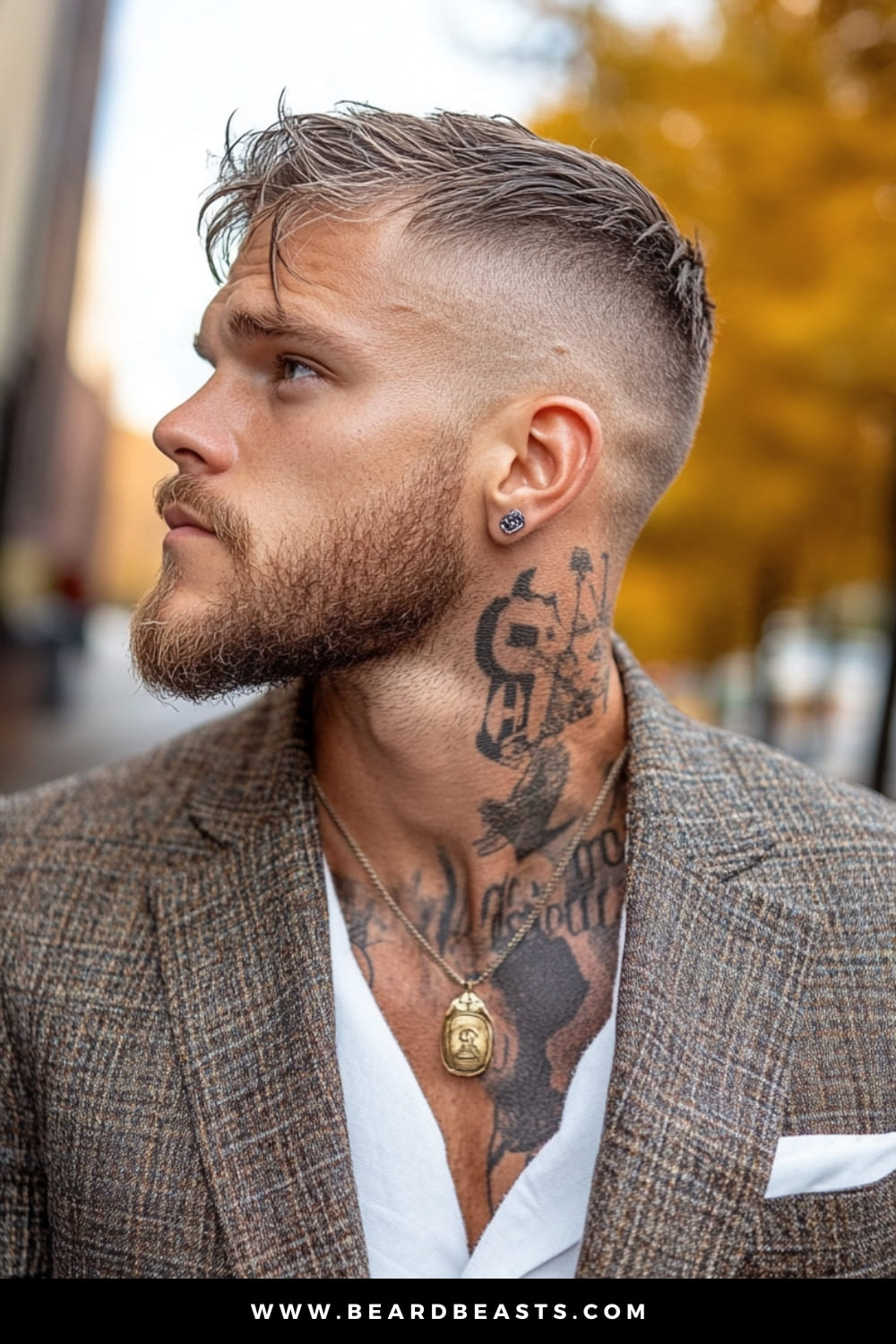 Side profile of a young man with a Long Top Crew Cut, a refined option within men's short on sides, long on top haircuts. The hairstyle features a slightly longer top that adds texture and movement, paired with closely shaved sides that provide a clean, sophisticated look, perfect for both casual and formal settings.
