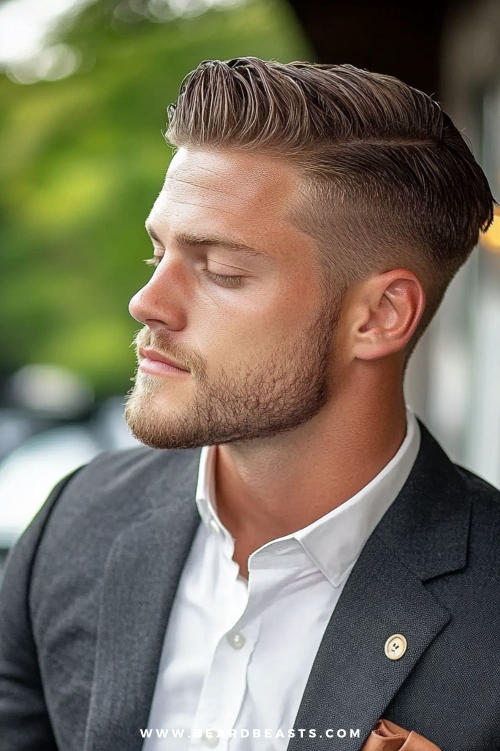 Man wearing a refined quiff with side part hairstyle, featuring neatly combed, voluminous hair on top with a sharp side part for definition. The sides are expertly tapered, creating a clean, professional look. Paired with a well-tailored suit and a subtle beard, this hairstyle is a perfect blend of modern flair and classic elegance, making it an ideal choice for those seeking sophisticated men's formal hairstyles.