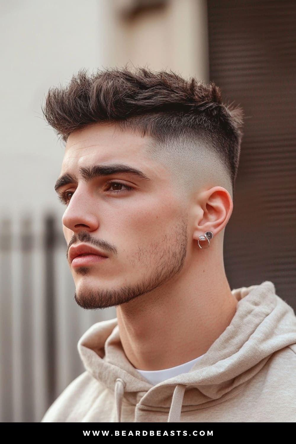 Side profile of a young man with a Messy Top and Short Sides hairstyle, featuring a textured, tousled top that contrasts with the cleanly shaved sides. The look exudes a casual yet stylish vibe, perfect for a modern, laid-back appearance.